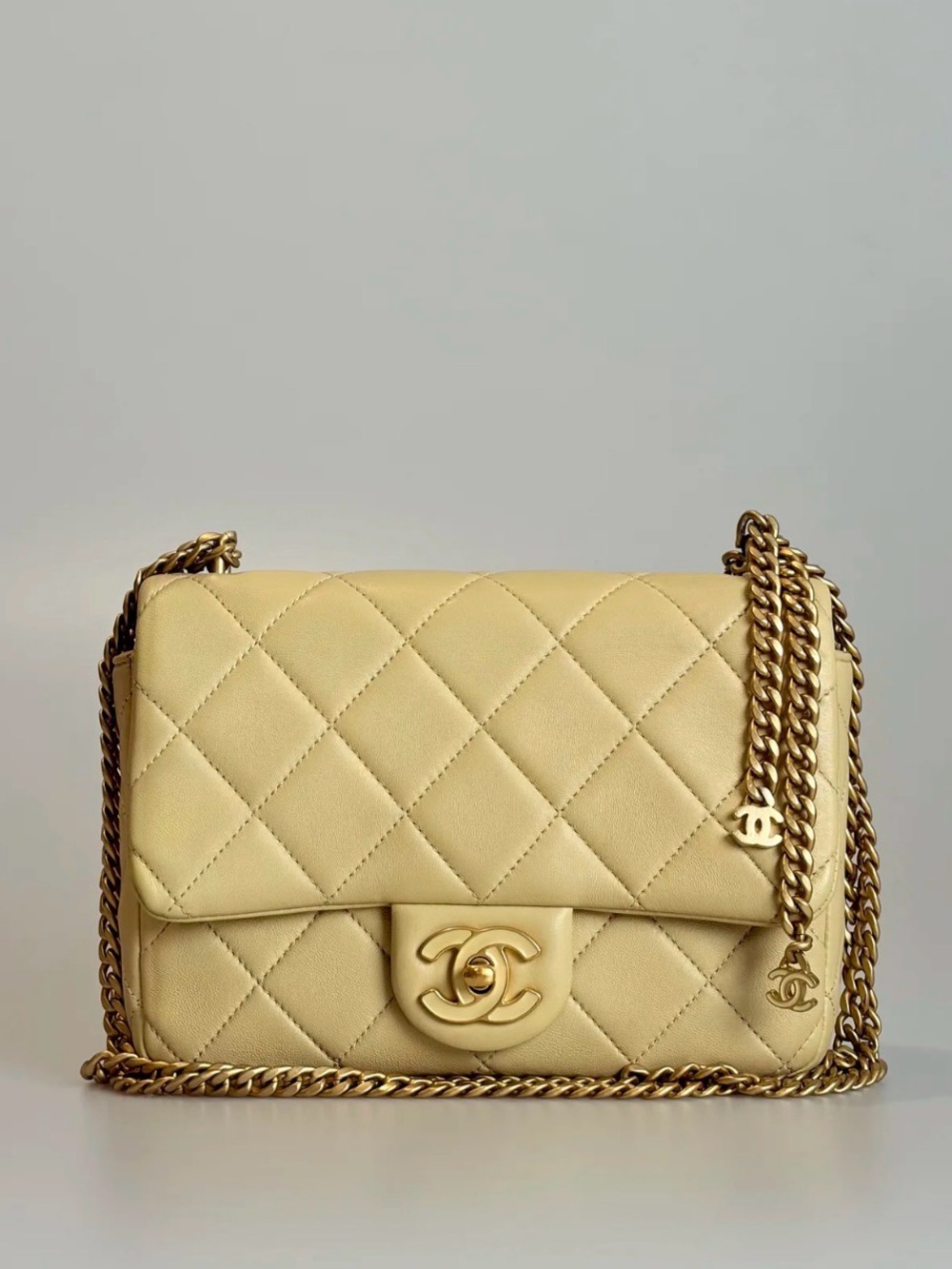 CHANEL Lambskin Enamel Quilted Pending CC Mini Square Flap Yellow